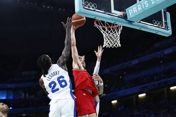 奥运乒乓球团体赛金牌：团队协作与个人技术的完美结合